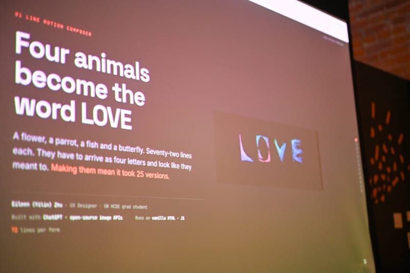 A projected slide reading four animals become the word LOVE, with a small line-art rendering of the word beside the text.